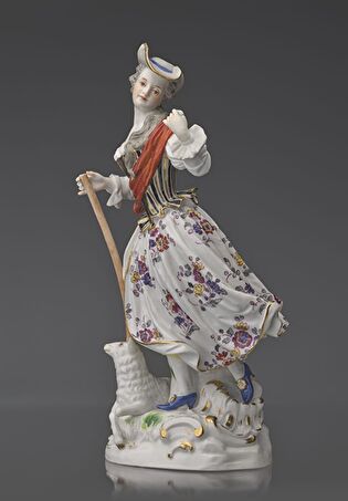 Shepherdess with a lamb